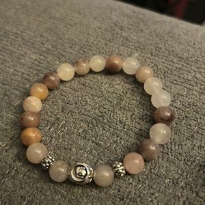 Violet quartz bracelet with buddha charm